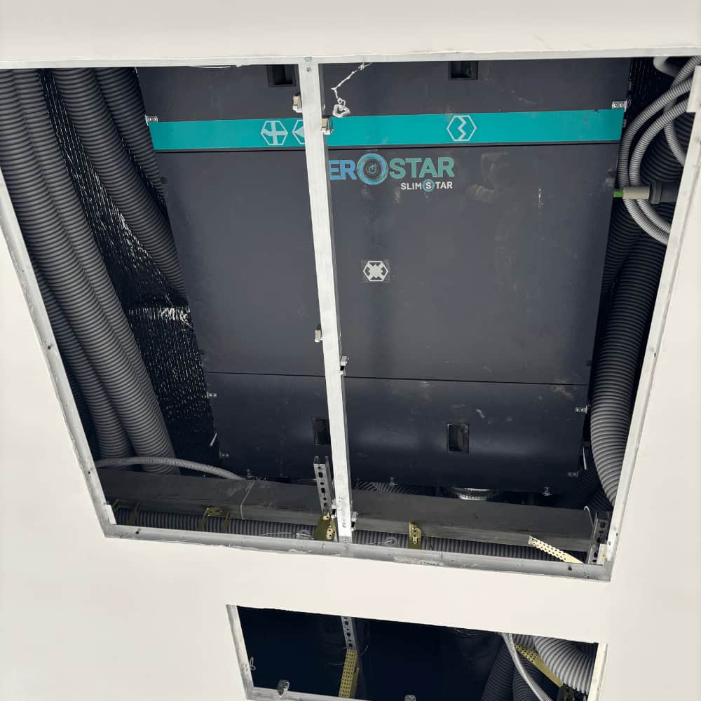Скрытый монтаж рекуператора Aerostar SlimStar в потолке частного дома